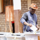 The late Nkurunziza casting his vote on May 20.